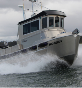 Front view of a North River Bristol Bay aluminum fishing boat on the water.